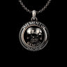 925 sterling silver Gemini pendant with twin skulls memento mori design on black background showing detailed craftsmanship