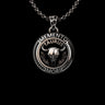 Silver Taurus Pendant with 'Memento Mori' inscription and a bull skull. Handcrafted from 925 sterling silver with an oxidized finish.
