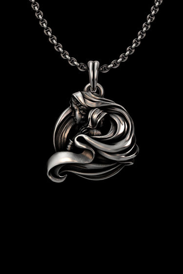 925 sterling silver goddess pendant with flowing wave design on black background showing intricate details