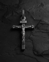 925 sterling silver crucifix pendant with detailed Jesus figure and INRI inscription on textured stone background