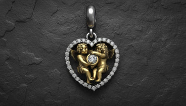 Silver angel heart pendant with gold vermeil finish displaying intricate cherub craftsmanship and bail detail