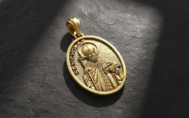 Catholic bishop pendant in silver showing Saint Nicholas with mitre and staff in traditional iconography