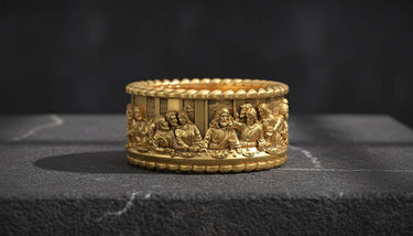 Close-up view of religious Last Supper ring with rope border and intricate biblical scene metalwork craftsmanship