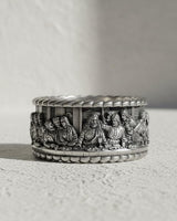 925 sterling silver Last Supper ring with detailed biblical scene engraving displayed on neutral background
