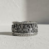 925 sterling silver Last Supper ring with detailed biblical scene engraving displayed on neutral background