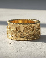 Gold vermeil Last Supper ring showing Jesus Christ and twelve apostles carved around the band in detail