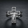 925 sterling silver Jesus cross ring with Christ the Redeemer design and ornate Celtic band on textured surface