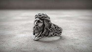 Side angle of sterling silver Jesus ring showing dimensional Crown of Thorns design and band thickness