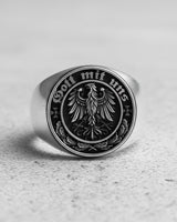 925 sterling silver Gott Mit Uns ring with German coat of arms eagle design on textured surface background