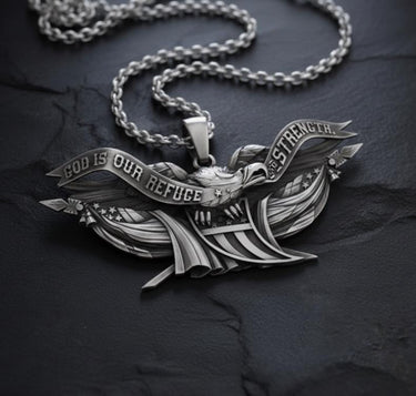 Detailed view of patriotic eagle pendant showing intricate wing feathers and religious message engraving