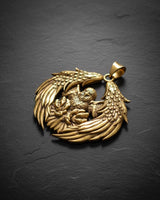 Close-up of silver eagle pendant displaying intricate talon and feather craftsmanship with oxidized accents