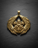 Side angle view of handcrafted American eagle pendant showing dimensional wing detail and gold vermeil finish