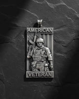 925 sterling silver American Veteran pendant with detailed tactical soldier and USA flag design on dark slate background