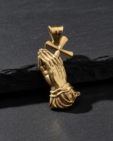 925 sterling silver praying hands cross pendant with gold vermeil finish on black leather background