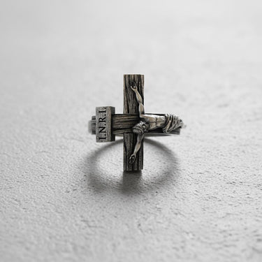 Front view of handcrafted Jesus cross ring showing Christ figure and oxidized sterling silver finish details