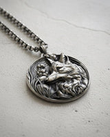 Close-up view of handcrafted fox head pendant showing detailed fur texture and oxidized silver finish craftsmanship