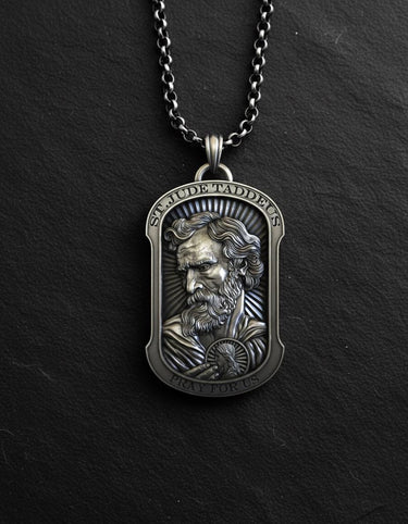 Religious pendant necklace featuring St. Jude with oxidized finish and chain displayed on black background