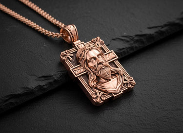 Detailed view of handcrafted Jesus portrait cross pendant showing sacred heart and crown of thorns artwork