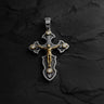 925 sterling silver crucifix pendant with detailed Jesus figure and CZ stones on dark wooden surface