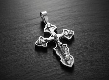 Rose gold plated crucifix pendant showing ornate religious design with cubic zirconia crystal accents