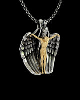 Angled view of the two-tone Angel Crucifix Pendant, showing the 3D craftsmanship of the silver angel and gold figure.