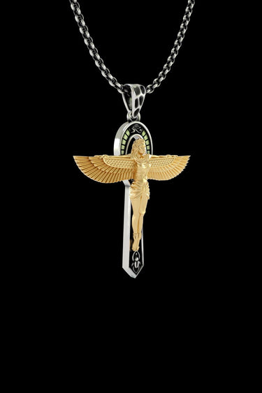 Angled view of the two-tone Egyptian cross pendant highlighting the detailed gold wings and the silver cross with scarab symbol.