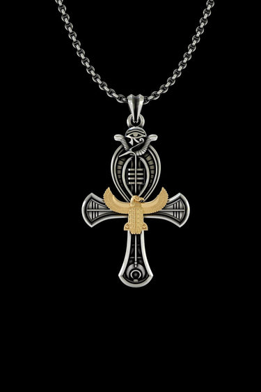 Two-tone Egyptian Ankh Pendant in sterling silver with a gold vermeil Eye of Ra and falcon, shown on a silver link chain.
