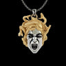 925 sterling silver Medusa pendant with gold vermeil snake hair and fierce expression on black background
