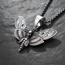 Silver Death Head Moth Pendant with an oxidized finish, showcasing detailed wing patterns on a dark slate background.
