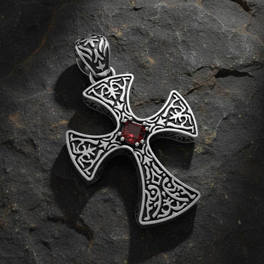Close-up view of handcrafted Celtic cross showing ornate metalwork and traditional knotwork design details