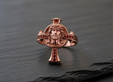 Rose gold religious ring featuring detailed Jesus portrait and crown of thorns design
