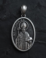 925 sterling silver Saint Nicholas medal with intricate religious engravings and episcopal vestments detail