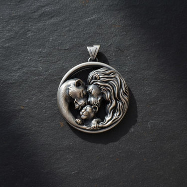 Detailed view of handcrafted lion family pendant with flowing manes and tender family bond in sterling silver