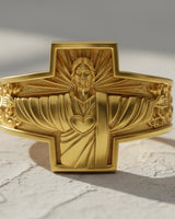 Side view of handcrafted Jesus cross ring showing Christ the Protector with divine light rays and ornate band details