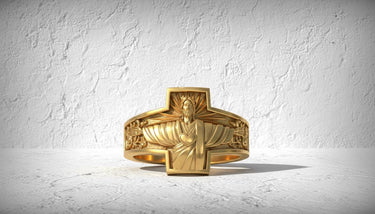 Close-up detail of Sacred Heart symbol and flowing robes design on gold vermeil sterling silver religious ring