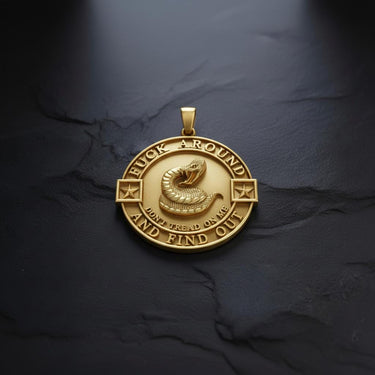 Silver Gadsden pendant with oxidized finish and detailed rattlesnake on matching chain necklace