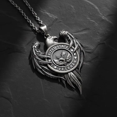 925 sterling silver veteran eagle pendant with United States military text and detailed wing design on dark slate