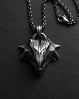 925 sterling silver griffin pendant with intricate geometric design displayed on dark textured background