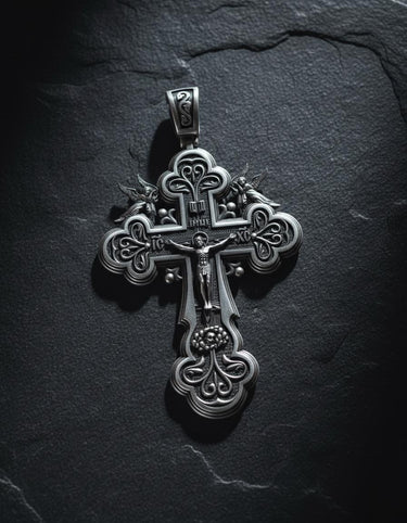 925 sterling silver Orthodox cross pendant with ornate angel details and traditional Russian design on dark slate