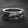 925 sterling silver Moses ring with detailed prophet sculpture and black rhodium finish on dark wooden surface