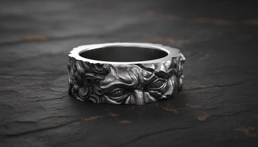 925 sterling silver Moses ring with detailed prophet sculpture and black rhodium finish on dark wooden surface