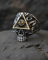 925 sterling silver all seeing eye skull ring with gold triangle and providence symbol displayed on dark stone