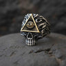 925 sterling silver all seeing eye skull ring with gold triangle and providence symbol displayed on dark stone