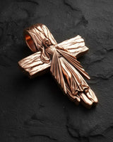 Detailed view of handcrafted Jesus crucifix pendant showing oxidized silver finish and sacred engravings