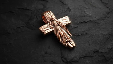 Detailed view of handcrafted Jesus crucifix pendant showing oxidized silver finish and sacred engravings