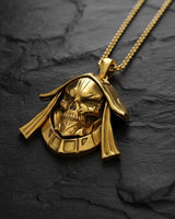 Close-up of silver skull pendant without chain displaying intricate metalwork and dark oxidized finish details