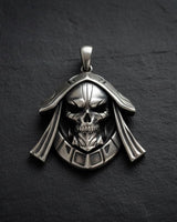 925 sterling silver hooded skull pendant with reaper design displayed on dark slate surface with gold chain