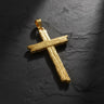 925 sterling silver cross pendant with wood grain texture displayed on dark slate background showing intricate details