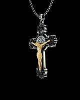 Side angle of Saint Benedict protection pendant displaying ornate religious craftsmanship and chain attachment