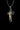 Close-up of the handcrafted Saint Benedict Cross Pendant highlighting the gold corpus and the St. Benedict medal text.